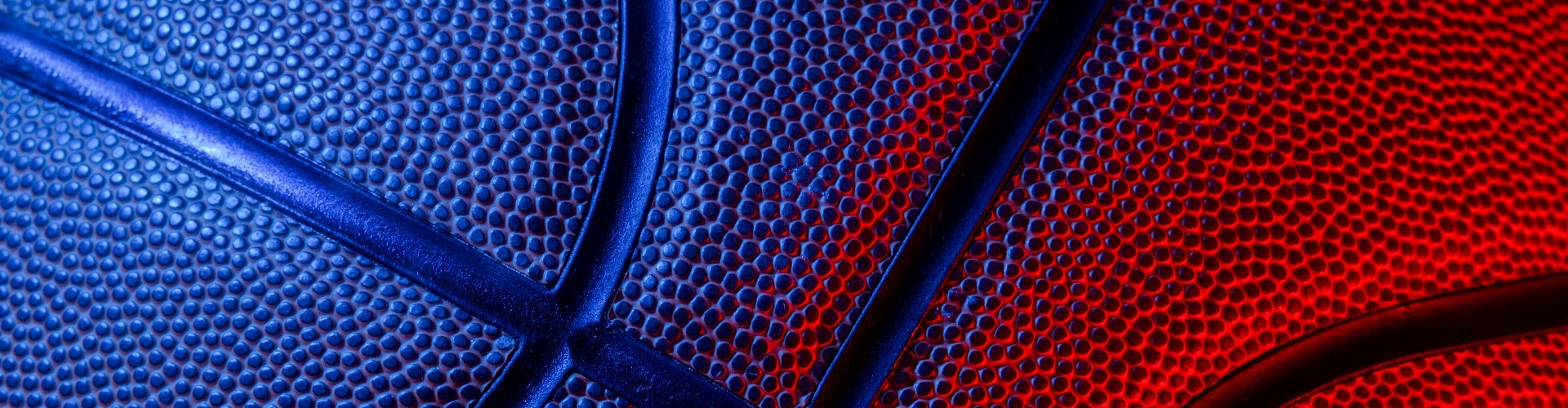 Closeup detail of basketball ball texture background. Blue neon Banner Art concept