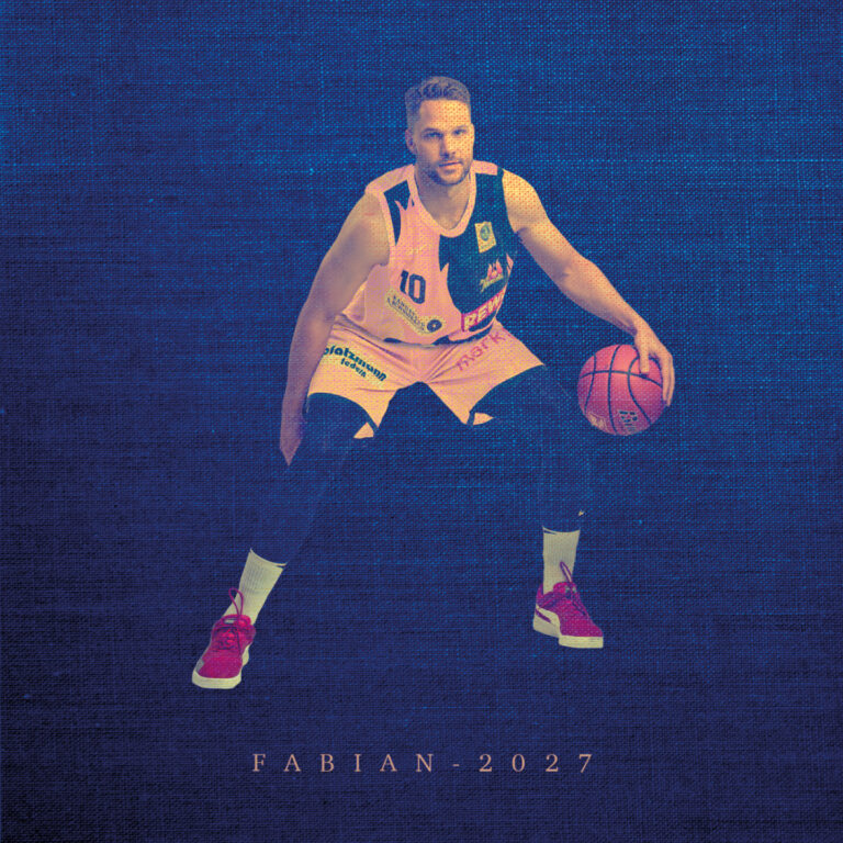 Ein Basketballspieler im gelben Trikot mit Ball, konzentrierter Ausdruck, vor blauem Hintergrund.